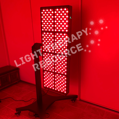 Red and Infrared Light therapy panel on a stand against a red wall with 'Light Therapy Resource' text.